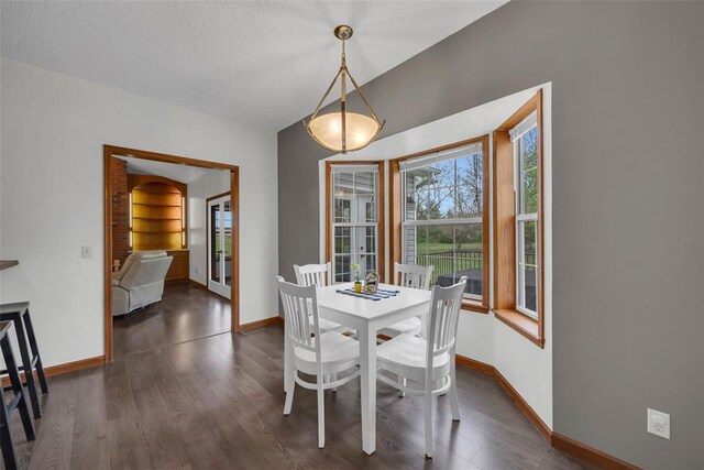 3 Jura Ct, Ofallon, MO 63368 - dining area featuring baseboards, dark wood-type flooring, and french doors