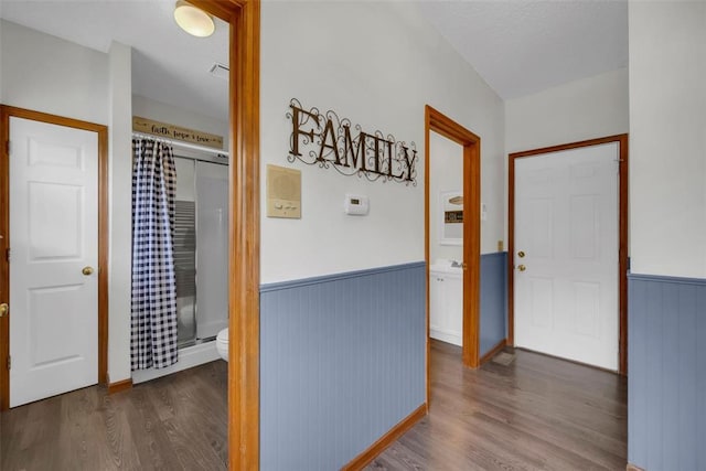 3 Jura Ct, Ofallon, MO 63368 - hallway featuring wainscoting and wood finished floors
