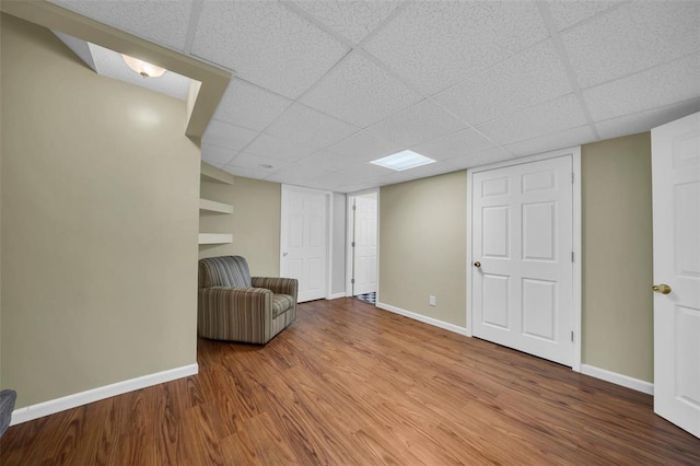3 Jura Ct, Ofallon, MO 63368 - unfurnished room featuring wood finished floors, baseboards, and a paneled ceiling