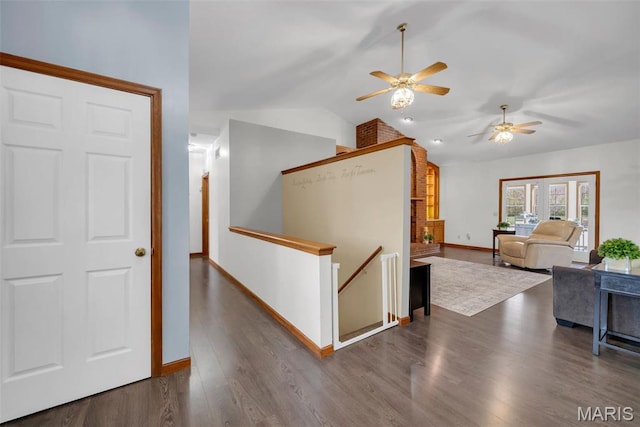 3 Jura Ct, Ofallon, MO 63368 - hall with an upstairs landing, lofted ceiling, and dark wood-style flooring