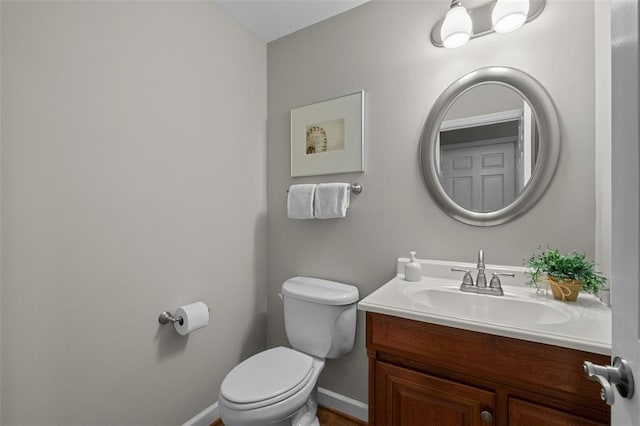 1807 Brookcreek Ln, Kirkwood, MO 63122 - bathroom with toilet, vanity, and baseboards