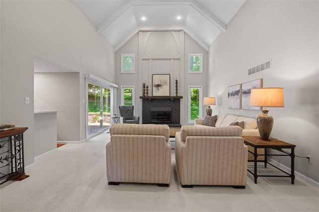 1807 Brookcreek Ln, Kirkwood, MO 63122 - living area with high vaulted ceiling, carpet flooring, baseboards, a brick fireplace, and recessed lighting