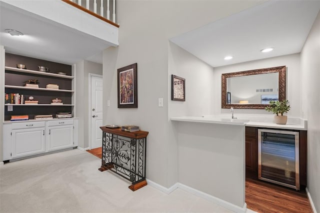 1807 Brookcreek Ln, Kirkwood, MO 63122 - indoor wet bar featuring beverage cooler, baseboards, recessed lighting, and built in features