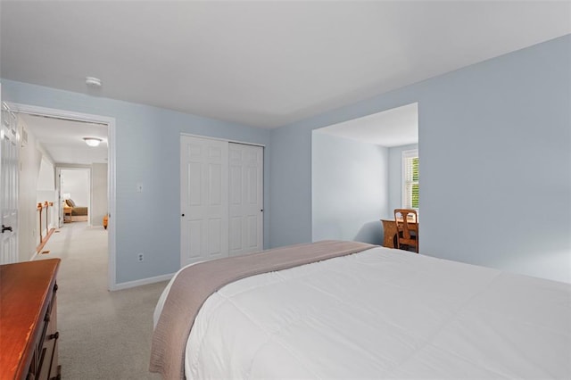1807 Brookcreek Ln, Kirkwood, MO 63122 - bedroom with light carpet, a closet, and baseboards