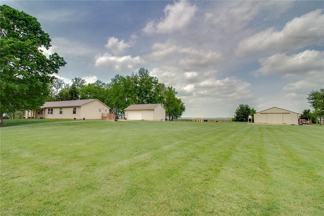 27467 Spruce Rd, Greenfield, IL 62044 - view of green lawn with an outbuilding and a detached garage