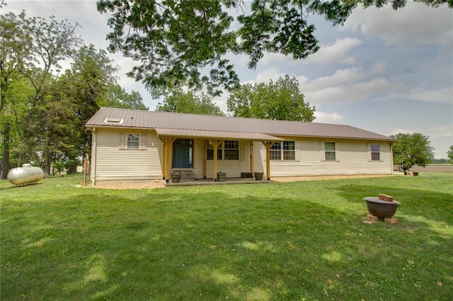 27467 Spruce Rd, Greenfield, IL 62044 - view of front of property featuring a front lawn, a porch, and metal roof