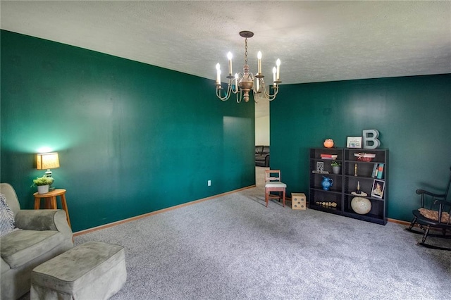 27467 Spruce Rd, Greenfield, IL 62044 - living area featuring carpet floors, a chandelier, a textured ceiling, and baseboards