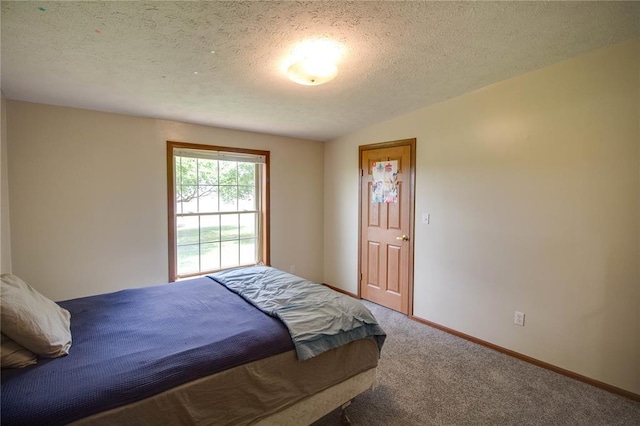 27467 Spruce Rd, Greenfield, IL 62044 - bedroom featuring carpet, a textured ceiling, and baseboards