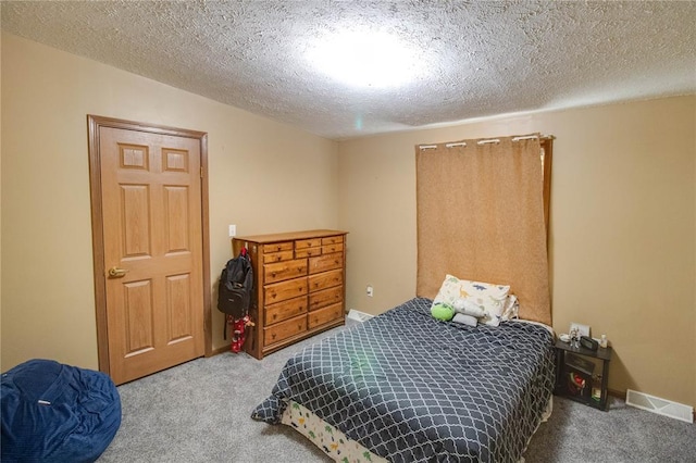 27467 Spruce Rd, Greenfield, IL 62044 - carpeted bedroom with a textured ceiling