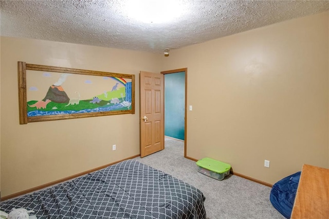 27467 Spruce Rd, Greenfield, IL 62044 - carpeted bedroom with a textured ceiling and baseboards