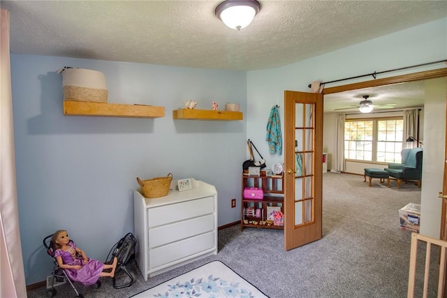 27467 Spruce Rd, Greenfield, IL 62044 - carpeted bedroom featuring a textured ceiling and french doors