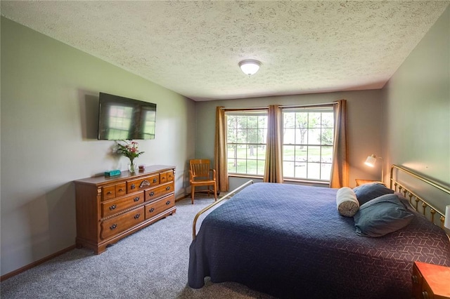 27467 Spruce Rd, Greenfield, IL 62044 - carpeted bedroom featuring a textured ceiling and baseboards