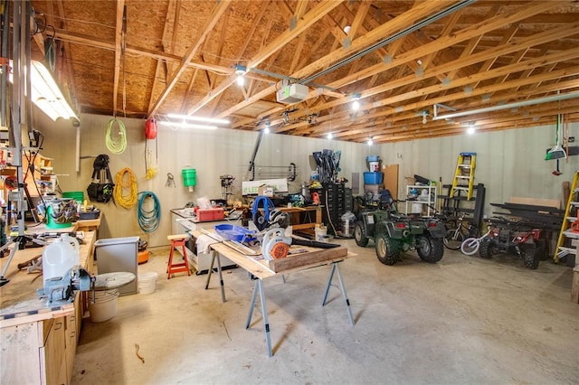 27467 Spruce Rd, Greenfield, IL 62044 - garage featuring a workshop area and a garage door opener