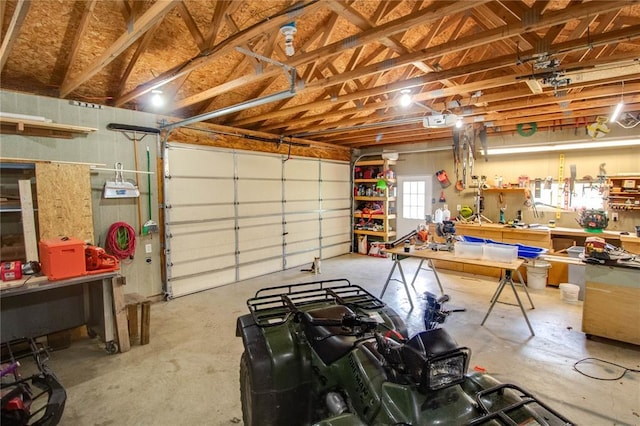 27467 Spruce Rd, Greenfield, IL 62044 - garage with a workshop area and a garage door opener