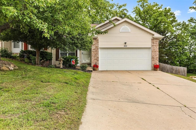 view of front of house featuring concrete driveway, a garage, and brick siding