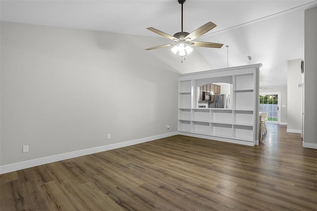 unfurnished living room featuring a ceiling fan, dark wood finished floors, baseboards, and high vaulted ceiling