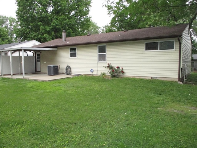 rear view of house featuring a patio area and central air condition unit