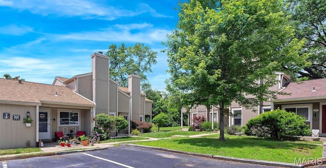 193 Harbor View Dr, Lake St Louis, MO 63367 - view of asphalt road with curbs