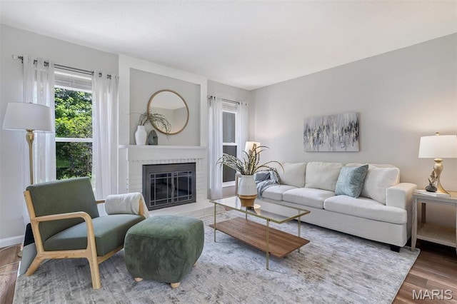 193 Harbor View Dr, Lake St Louis, MO 63367 - living area featuring a fireplace and wood finished floors