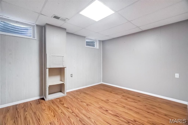 193 Harbor View Dr, Lake St Louis, MO 63367 - below grade area featuring light wood finished floors and a drop ceiling