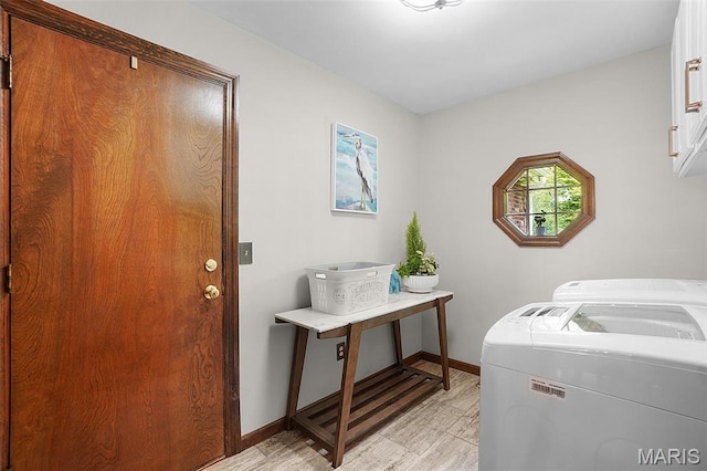 1553 Ridge Rd, Wildwood, MO 63021 - washroom with cabinet space and washing machine and dryer