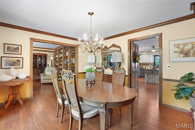 1553 Ridge Rd, Wildwood, MO 63021 - dining space featuring crown molding, a chandelier, wood finished floors, and a ceiling fan