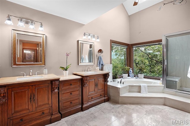 1553 Ridge Rd, Wildwood, MO 63021 - bathroom with double vanity, high vaulted ceiling, a bath, and a ceiling fan