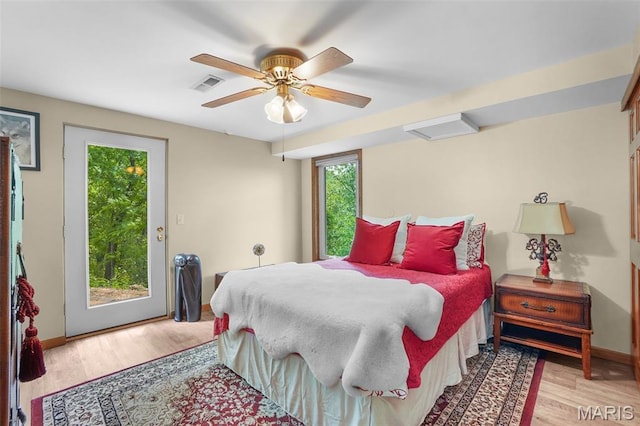 1553 Ridge Rd, Wildwood, MO 63021 - bedroom featuring access to outside, wood finished floors, and ceiling fan