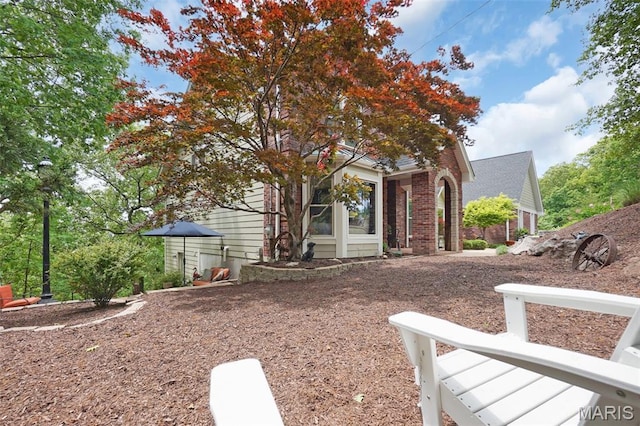 1553 Ridge Rd, Wildwood, MO 63021 - obstructed view of property with brick siding