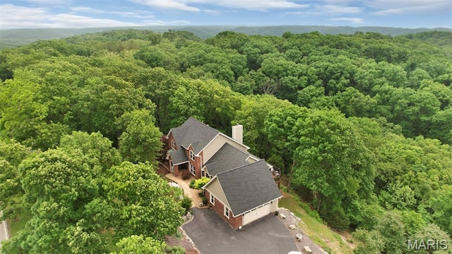 1553 Ridge Rd, Wildwood, MO 63021 - aerial view of property and surrounding area with a heavily wooded area