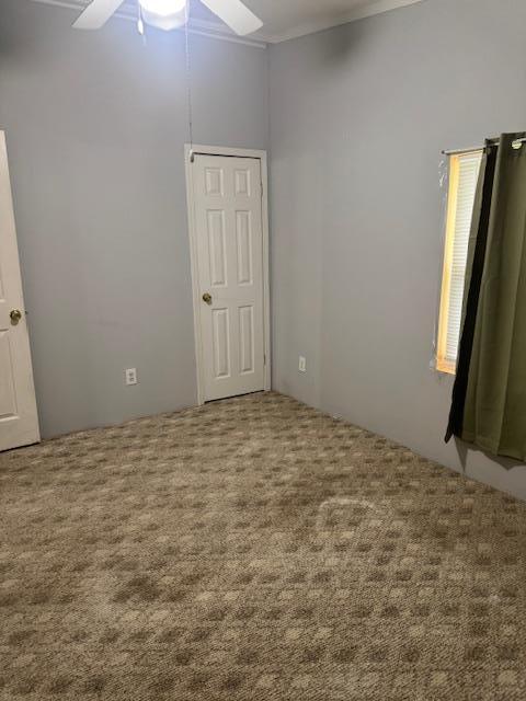 756 Eldon Dr, Bismarck, MO 63624 - carpeted empty room with a ceiling fan