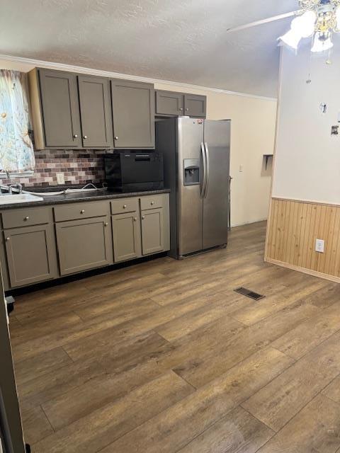 756 Eldon Dr, Bismarck, MO 63624 - kitchen featuring stainless steel fridge with ice dispenser, gray cabinetry, dark wood-style flooring, a ceiling fan, and a sink