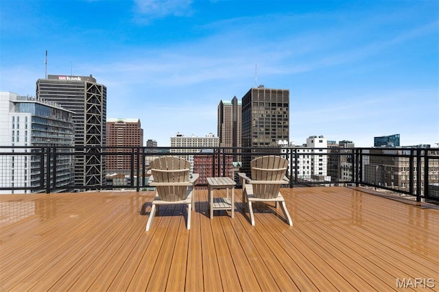 915 Olive St Unit 910, Saint Louis, MO 63101 - wooden deck featuring a city view