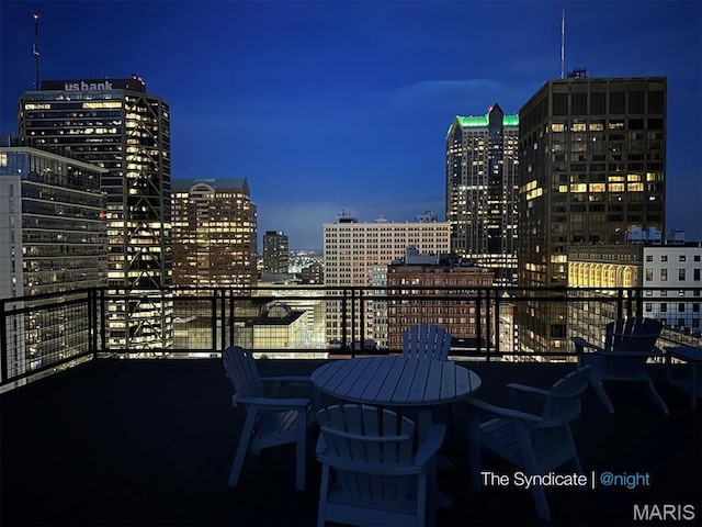 915 Olive St Unit 910, Saint Louis, MO 63101 - balcony at twilight with a view of city lights