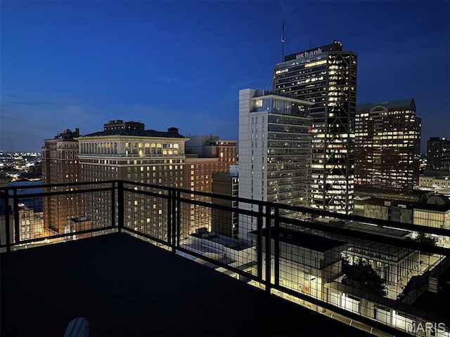 915 Olive St Unit 910, Saint Louis, MO 63101 - balcony at twilight with a view of city lights
