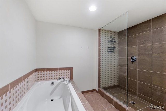 915 Olive St Unit 910, Saint Louis, MO 63101 - full bathroom featuring tiled shower, a garden tub, tile patterned flooring, and recessed lighting