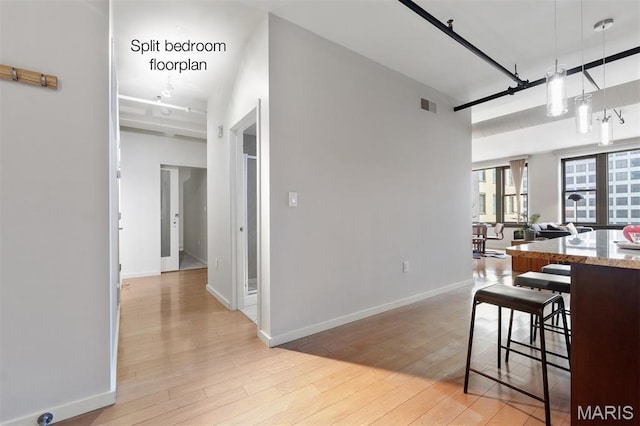 915 Olive St Unit 910, Saint Louis, MO 63101 - dining room with baseboards and light wood-type flooring