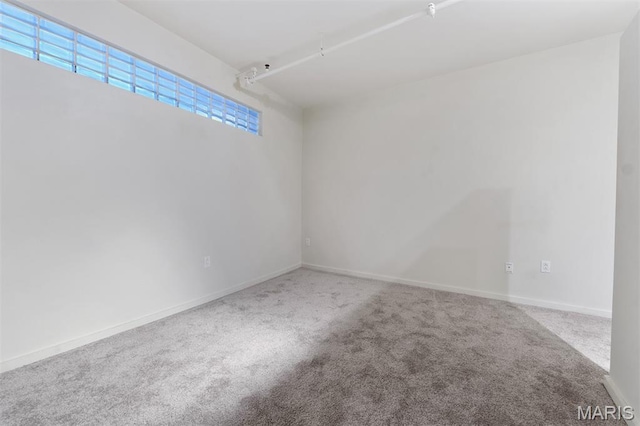 915 Olive St Unit 910, Saint Louis, MO 63101 - empty room with carpet flooring