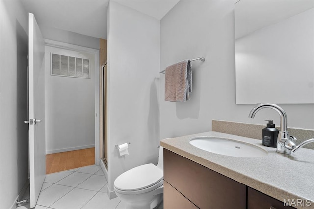 915 Olive St Unit 910, Saint Louis, MO 63101 - full bath featuring vanity, a shower stall, and tile patterned floors