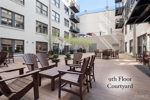 915 Olive St Unit 910, Saint Louis, MO 63101 - wooden terrace featuring outdoor dining area