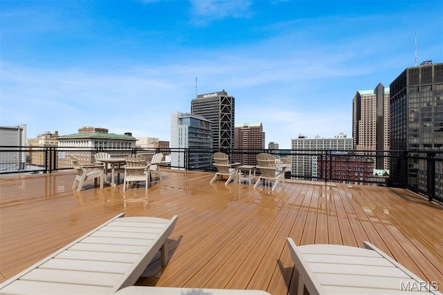 915 Olive St Unit 910, Saint Louis, MO 63101 - deck featuring outdoor dining space and a city view