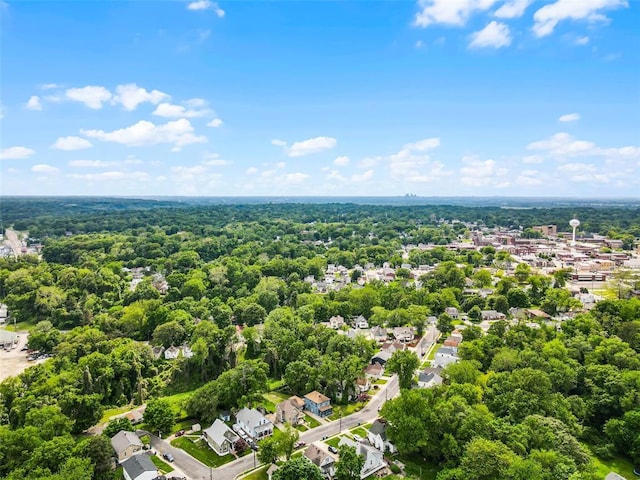 aerial view of residential area with a forest