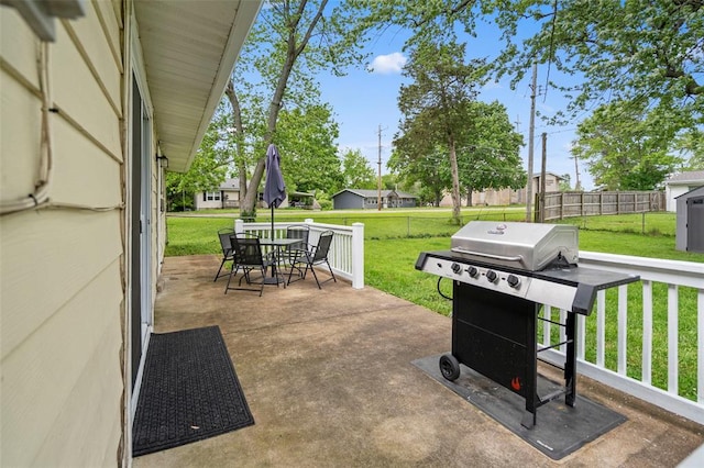 view of patio with outdoor dining space and area for grilling