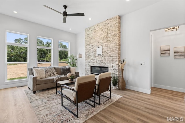 401 Rayburn Ave, Sunset Hills, MO 63127 - living area with a ceiling fan, light wood-style floors, a fireplace, baseboards, and recessed lighting