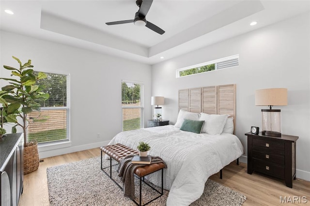 401 Rayburn Ave, Sunset Hills, MO 63127 - bedroom with a raised ceiling, recessed lighting, light wood-style flooring, baseboards, and ceiling fan