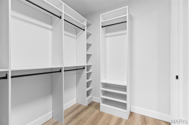 401 Rayburn Ave, Sunset Hills, MO 63127 - walk in closet featuring wood finished floors