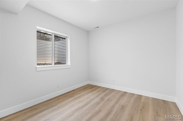 401 Rayburn Ave, Sunset Hills, MO 63127 - unfurnished room with light wood-style flooring and baseboards