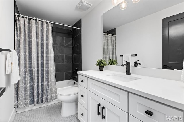 401 Rayburn Ave, Sunset Hills, MO 63127 - bathroom with vanity, toilet, shower / tub combo with curtain, and tile patterned flooring