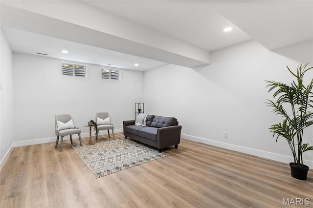 401 Rayburn Ave, Sunset Hills, MO 63127 - living area with wood finished floors, baseboards, and recessed lighting