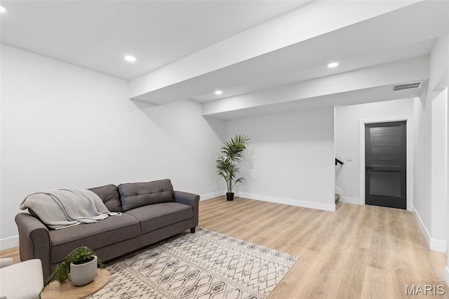 401 Rayburn Ave, Sunset Hills, MO 63127 - living room featuring light wood finished floors, recessed lighting, and baseboards